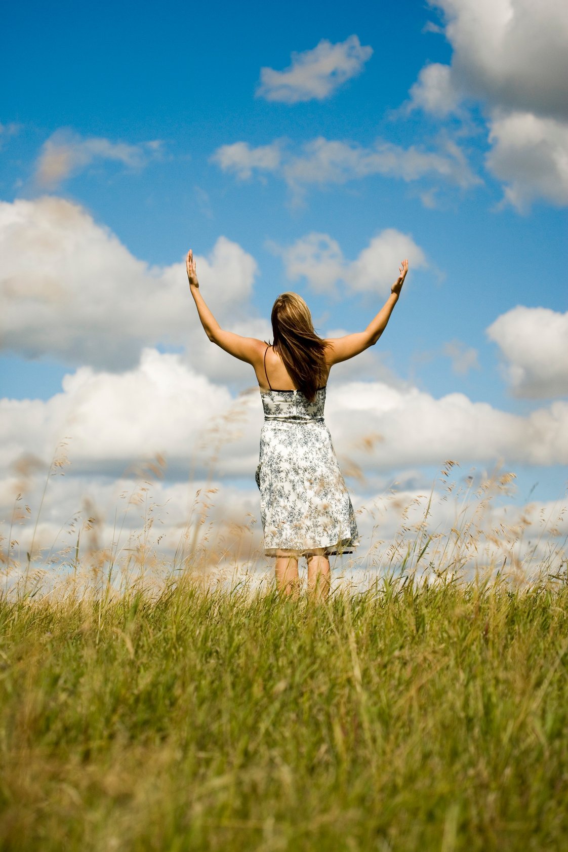 Woman with Hands Raised